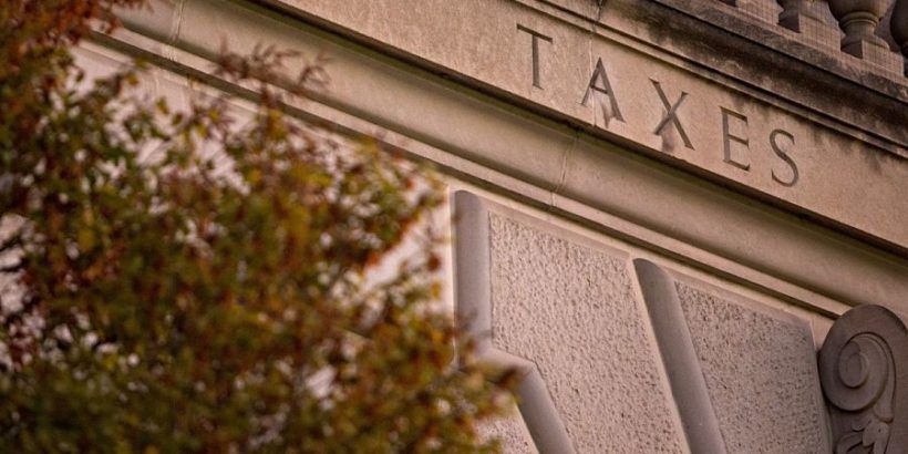 word-'taxes'-on-facade-of-IRS-building
