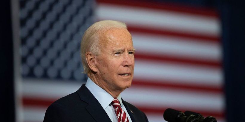 Joe-Biden-speaking-in-front-of-U.S.-flag